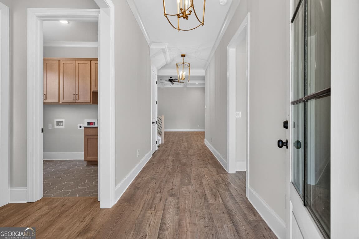 4 bedroom, 3.5 bathroom, 3,112 sq ft single family residence for sale at 5808 Mitchell Street, Flowery Branch, GA 30542 — photo 2