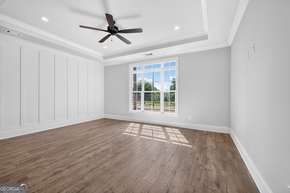 4 bedroom, 3.5 bathroom, 3,112 sq ft single family residence for sale at 5808 Mitchell Street, Flowery Branch, GA 30542 — photo 6