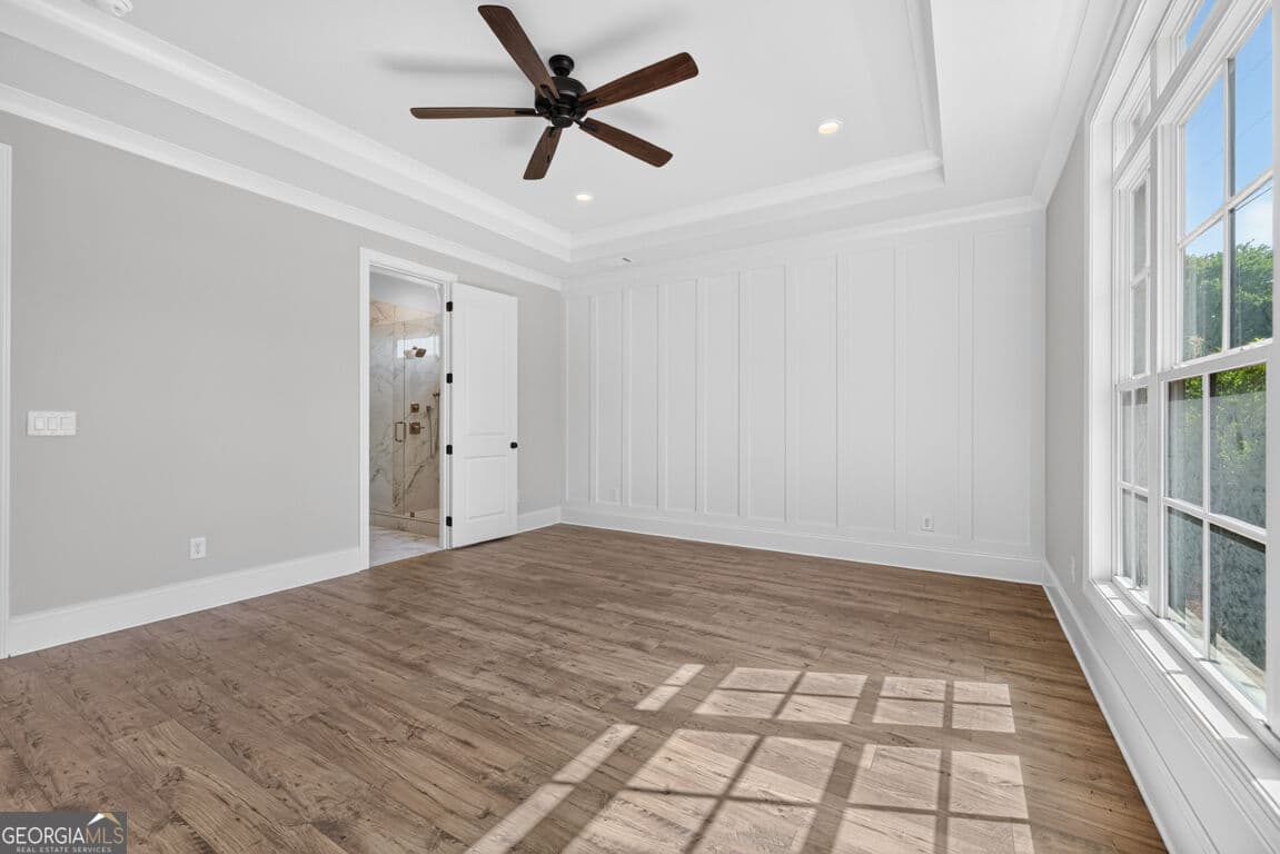 4 bedroom, 3.5 bathroom, 3,112 sq ft single family residence for sale at 5808 Mitchell Street, Flowery Branch, GA 30542 — photo 7