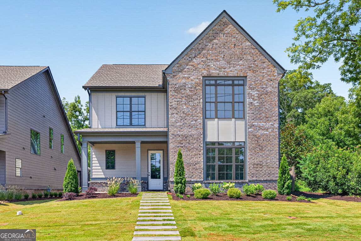 4 bedroom, 3.5 bathroom, 3,112 sq ft single family residence for sale at 5808 Mitchell Street, Flowery Branch, GA 30542 — photo 1 of 118