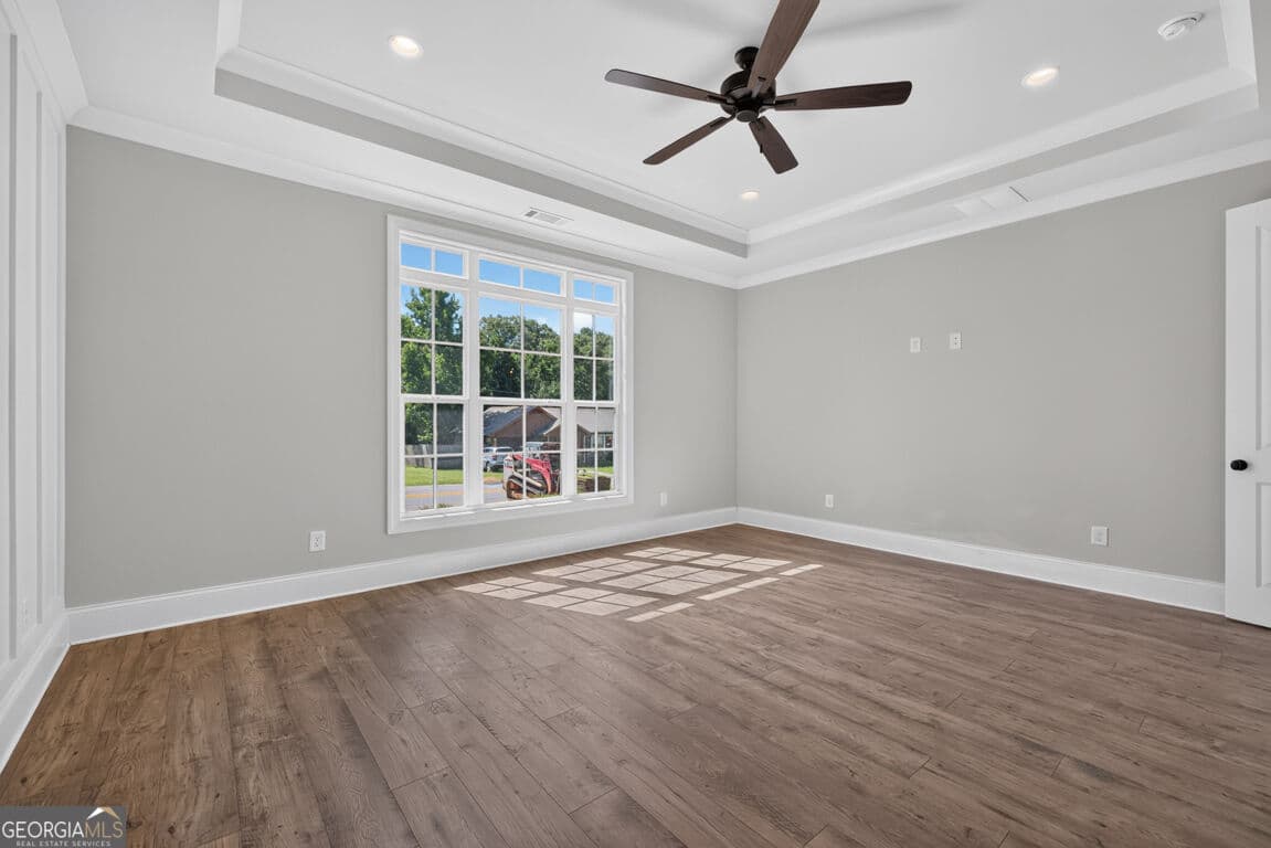 4 bedroom, 3.5 bathroom, 3,112 sq ft single family residence for sale at 5808 Mitchell Street, Flowery Branch, GA 30542 — photo 9