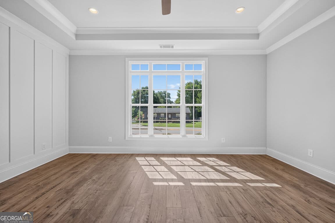 4 bedroom, 3.5 bathroom, 3,112 sq ft single family residence for sale at 5808 Mitchell Street, Flowery Branch, GA 30542 — photo 10