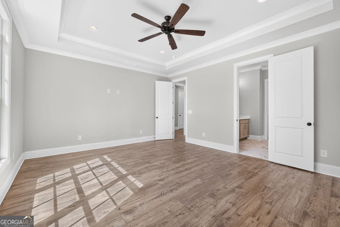4 bedroom, 3.5 bathroom, 3,112 sq ft single family residence for sale at 5808 Mitchell Street, Flowery Branch, GA 30542 — photo 8