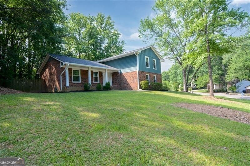 4 bedroom, 2 bathroom, 1,740 sq ft single family residence sold at 140 Ansley Court, Roswell, GA 30076