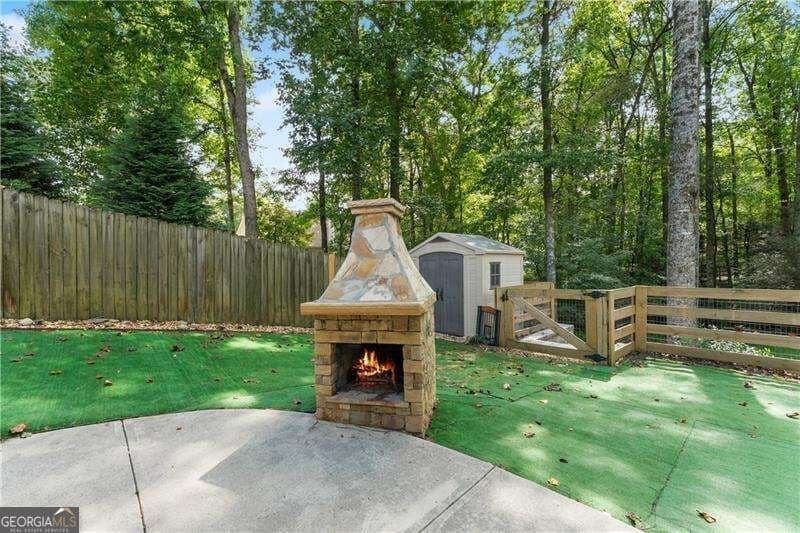 4 bedroom, 3.5 bathroom, 3,633 sq ft single family residence for sale at 5825 Birch Ridge Trail, Cumming, GA 30028 — photo 5