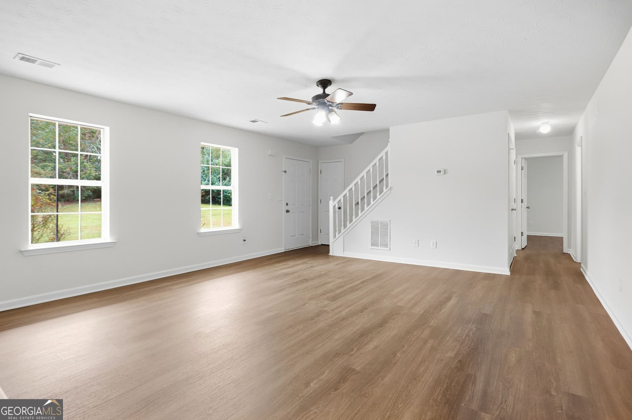 4 bedroom, 2.5 bathroom, 2,076 sq ft single family residence for sale at 310 Kaden Court, Mcdonough, GA 30252 — photo 4