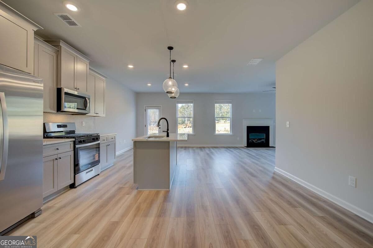 4 bedroom, 3 bathroom, 2,429 sq ft single family residence for sale at 324 Bedford Trace, Conyers, GA 30094 — photo 7