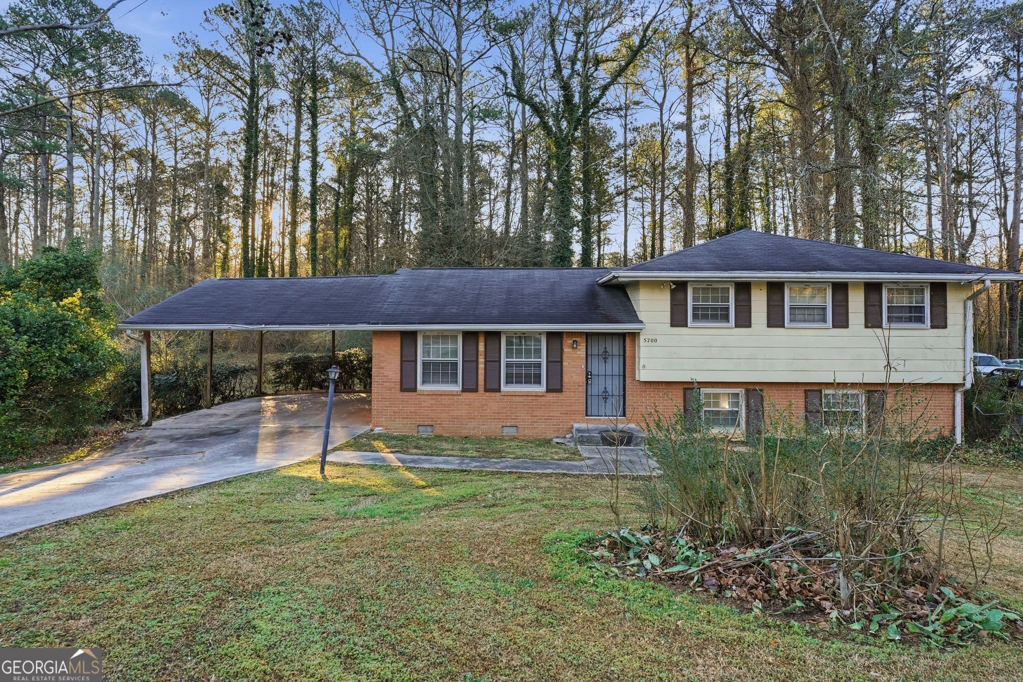4 bedroom, 2.5 bathroom, 1,612 sq ft single family residence for sale at 5700 Deerfield Trail, Atlanta, GA 30349 — photo 2