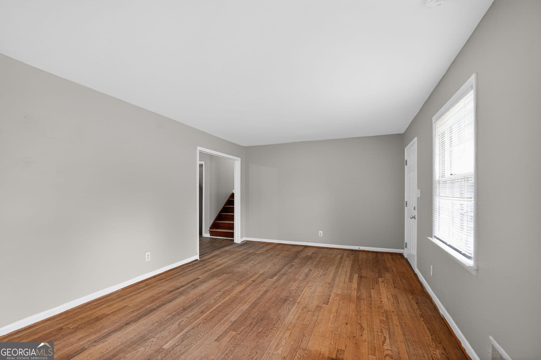 4 bedroom, 2.5 bathroom, 1,612 sq ft single family residence for sale at 5700 Deerfield Trail, Atlanta, GA 30349 — photo 6