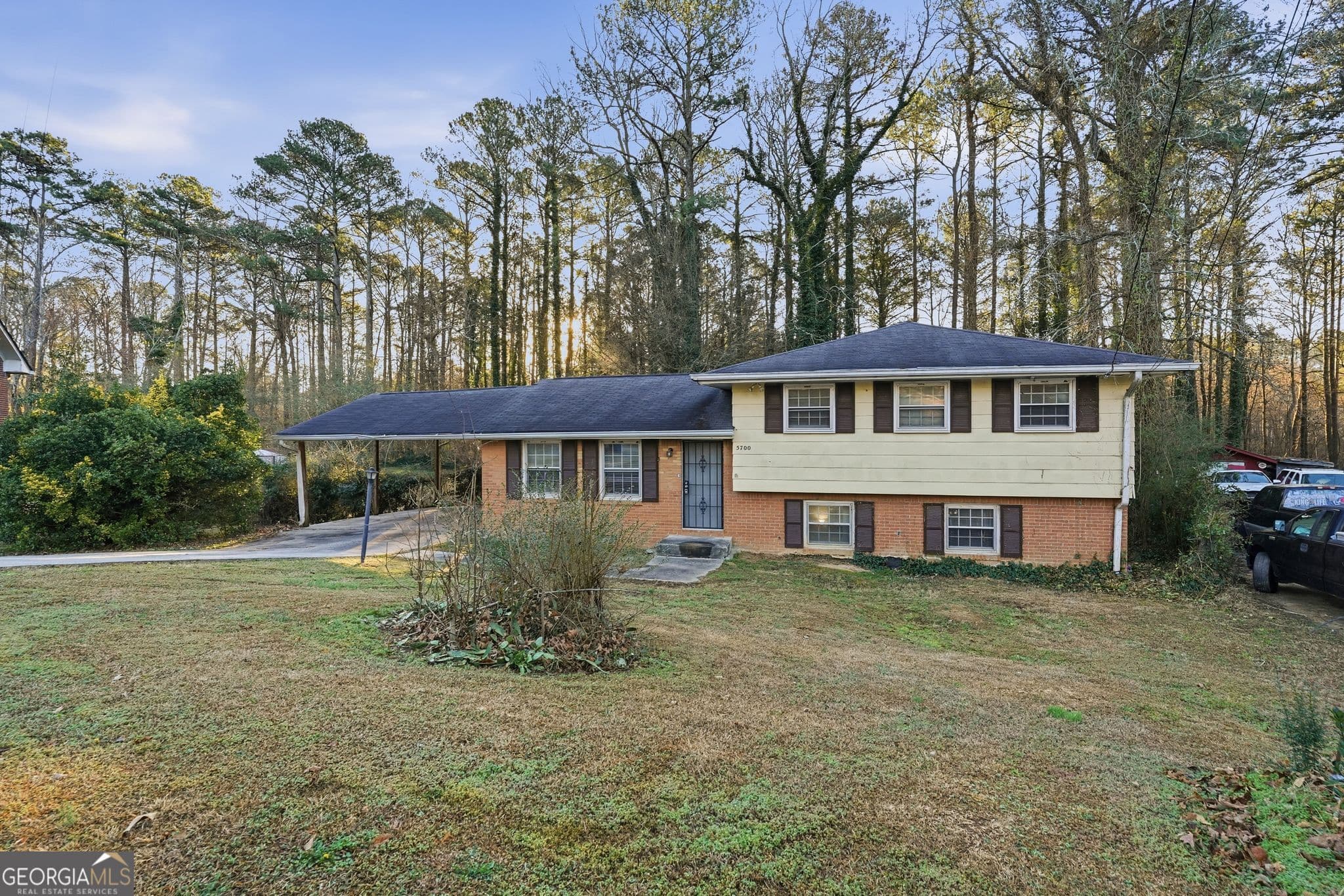 4 bedroom, 2.5 bathroom, 1,612 sq ft single family residence for sale at 5700 Deerfield Trail, Atlanta, GA 30349 — photo 3
