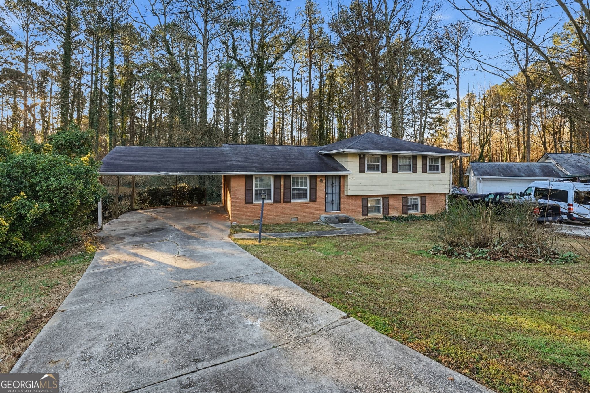 4 bedroom, 2.5 bathroom, 1,612 sq ft single family residence for sale at 5700 Deerfield Trail, Atlanta, GA 30349