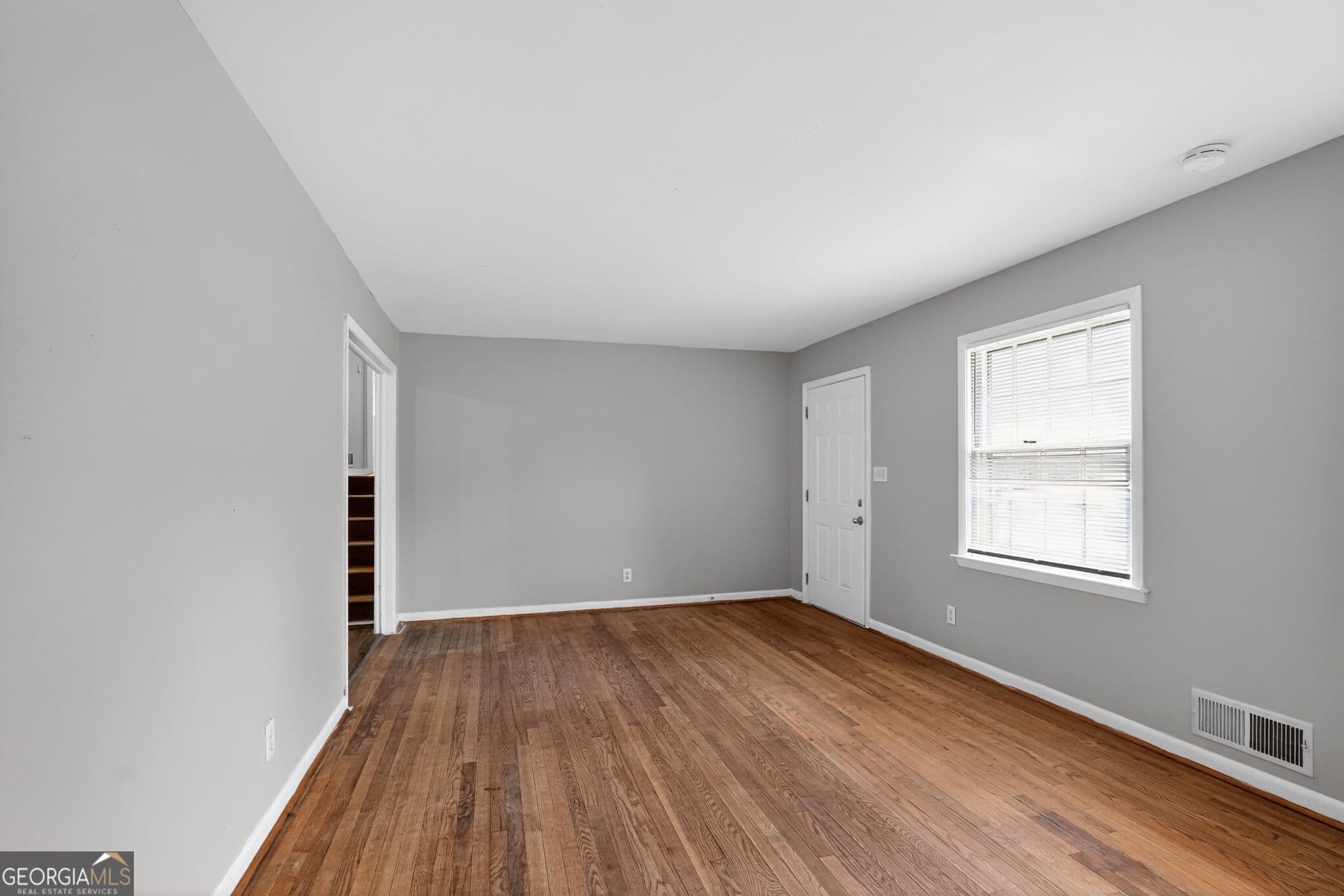 4 bedroom, 2.5 bathroom, 1,612 sq ft single family residence for sale at 5700 Deerfield Trail, Atlanta, GA 30349 — photo 5