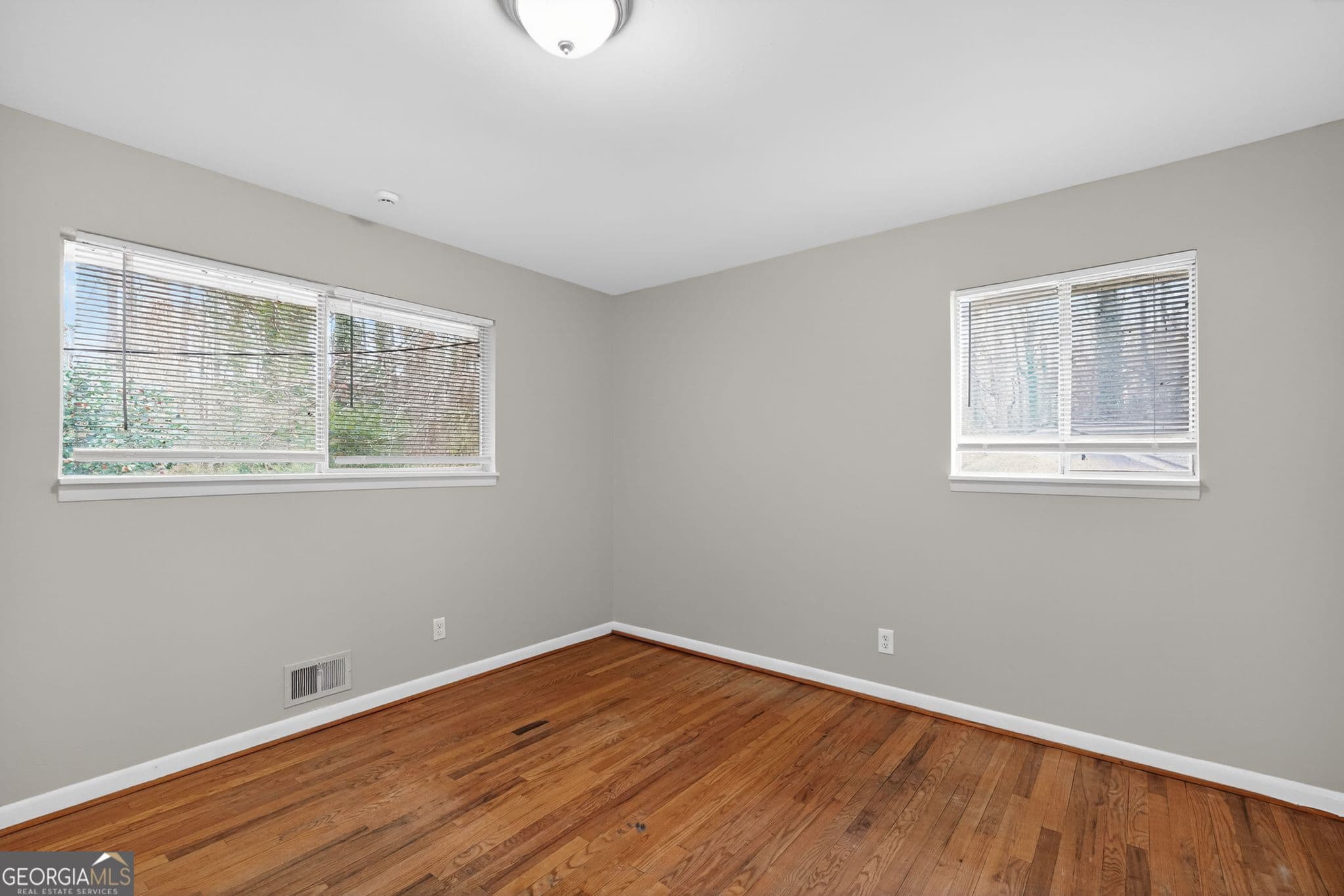 4 bedroom, 2.5 bathroom, 1,612 sq ft single family residence for sale at 5700 Deerfield Trail, Atlanta, GA 30349 — photo 9