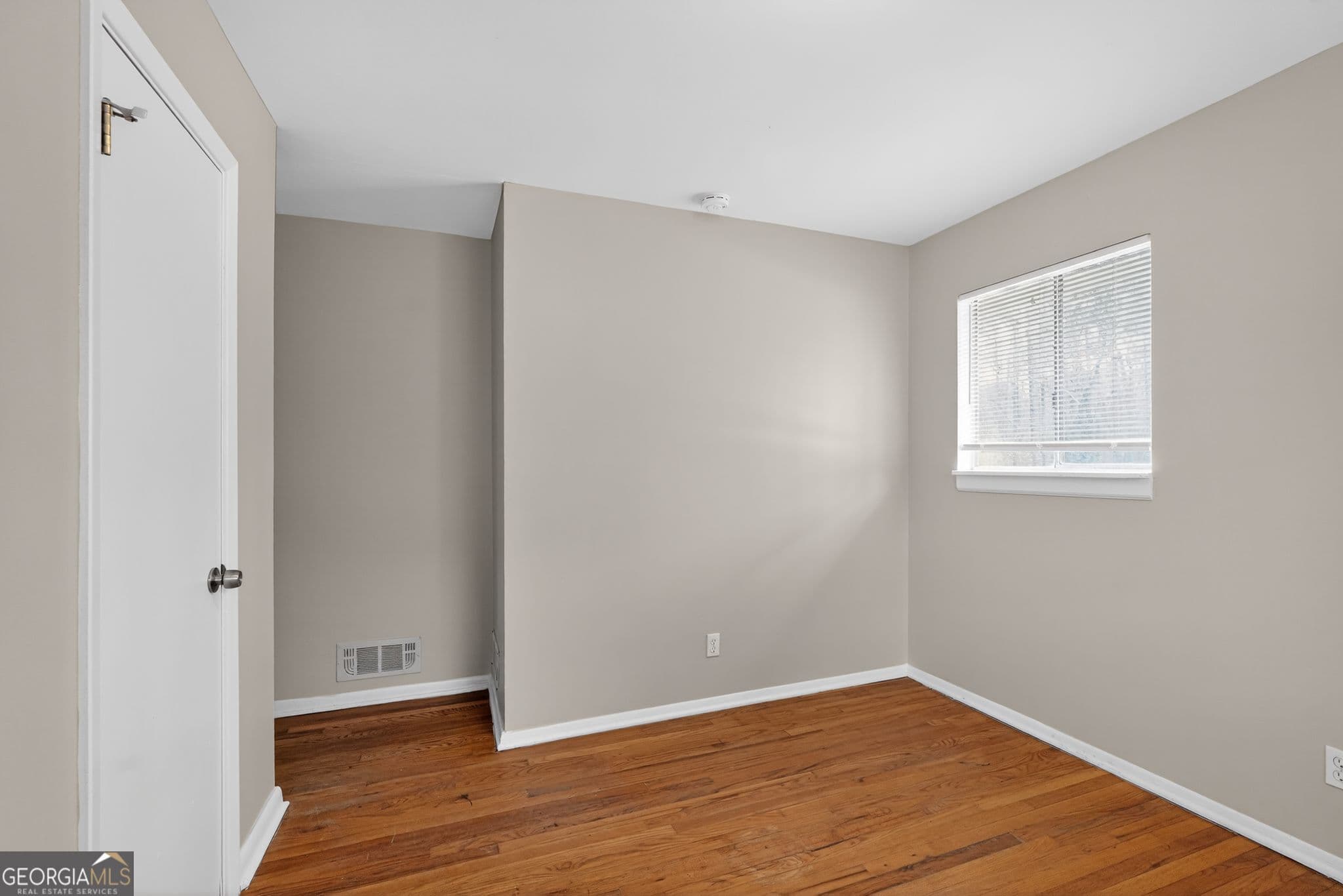 4 bedroom, 2.5 bathroom, 1,612 sq ft single family residence for sale at 5700 Deerfield Trail, Atlanta, GA 30349 — photo 4