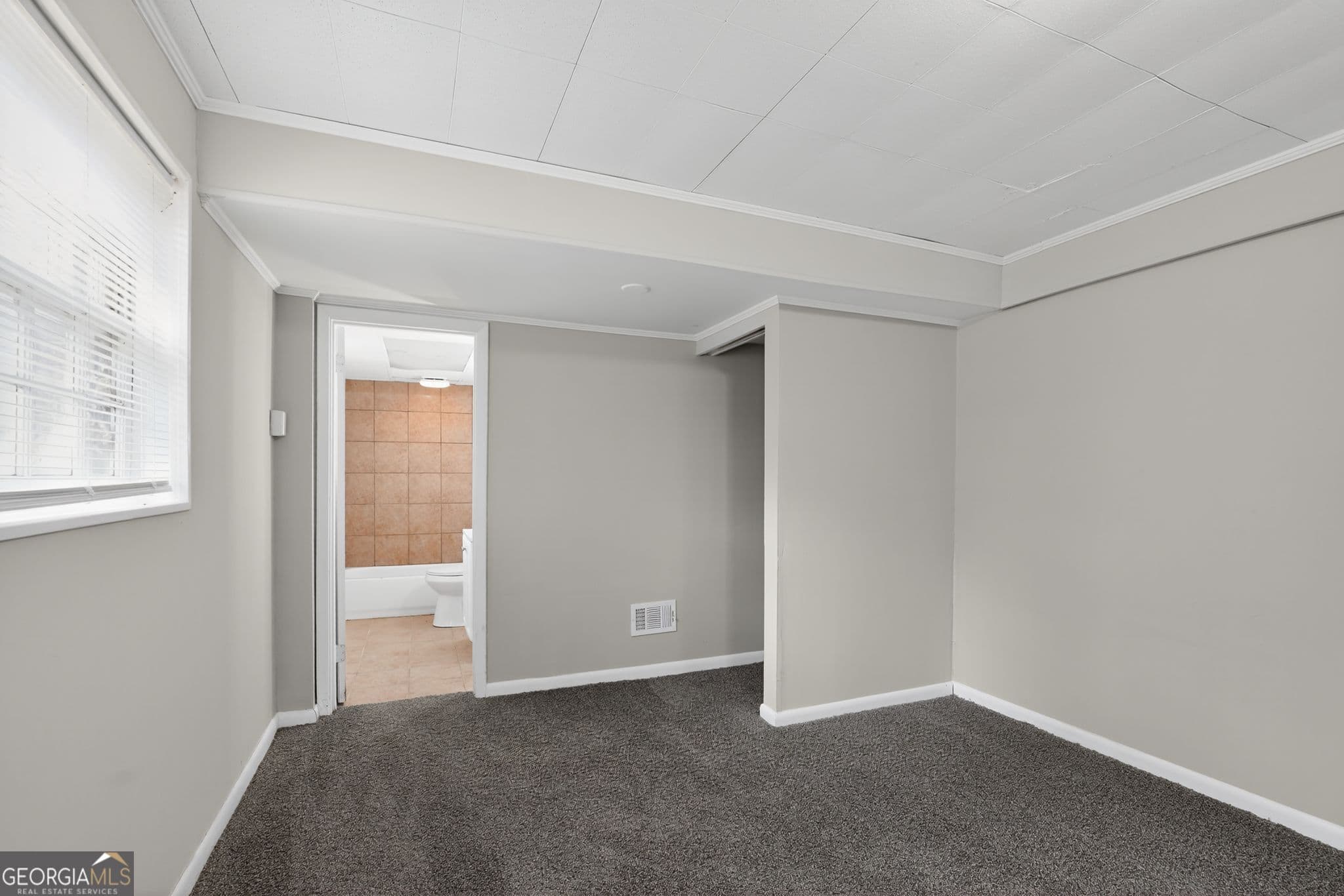 4 bedroom, 2.5 bathroom, 1,612 sq ft single family residence for sale at 5700 Deerfield Trail, Atlanta, GA 30349 — photo 8