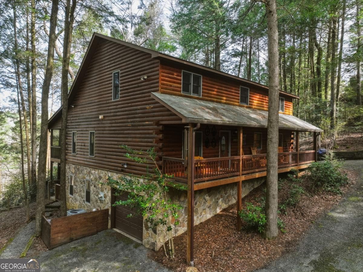 5 bedroom, 3.5 bathroom, 3,538 sq ft cabin,single family residence for sale at 58 River Road, Cherry Log, GA 30522 — photo 6