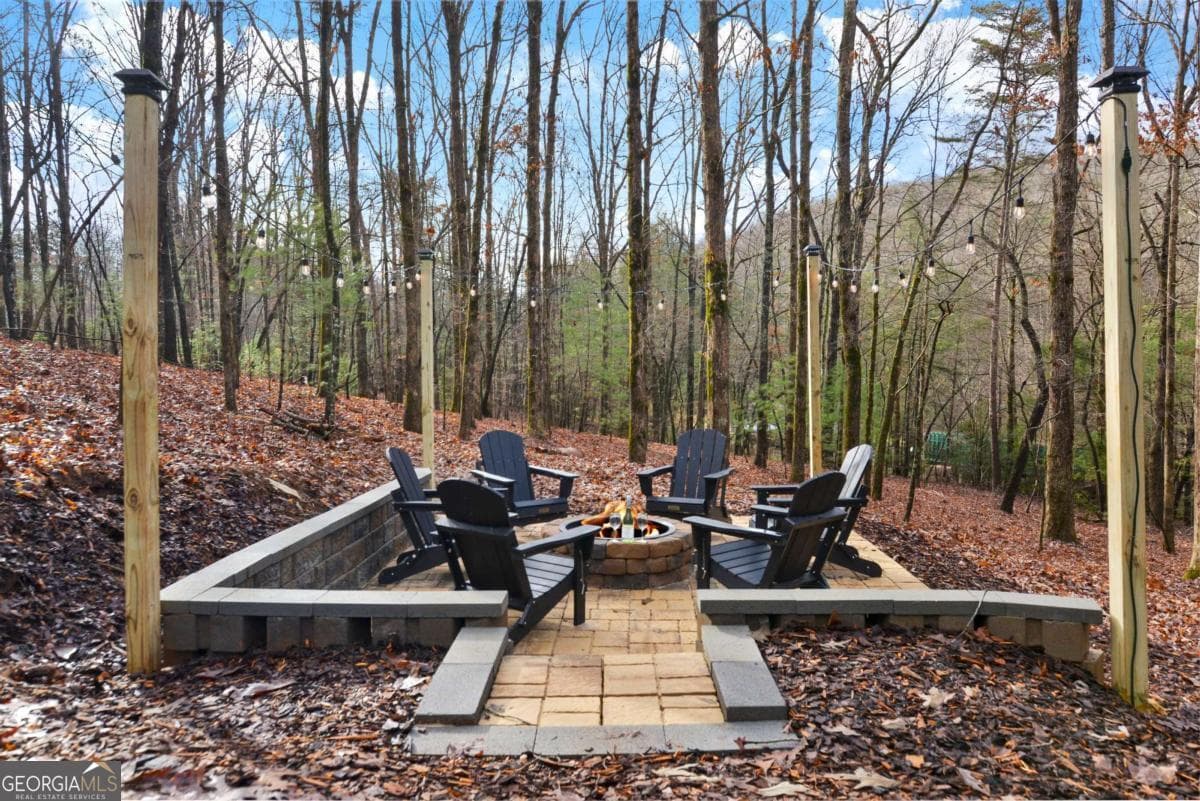 4 bedroom, 3 bathroom, 2,080 sq ft cabin,single family residence for sale at 136 Fox Run Drive, Blue Ridge, GA 30513 — photo 6