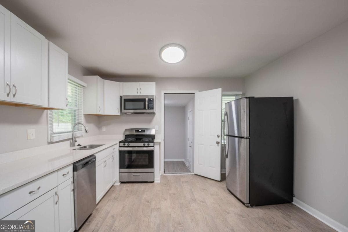 3 bedroom, 2 bathroom, 1,100 sq ft single family residence for sale at 1951 La Mesa Lane, Decatur, GA 30032 — photo 6