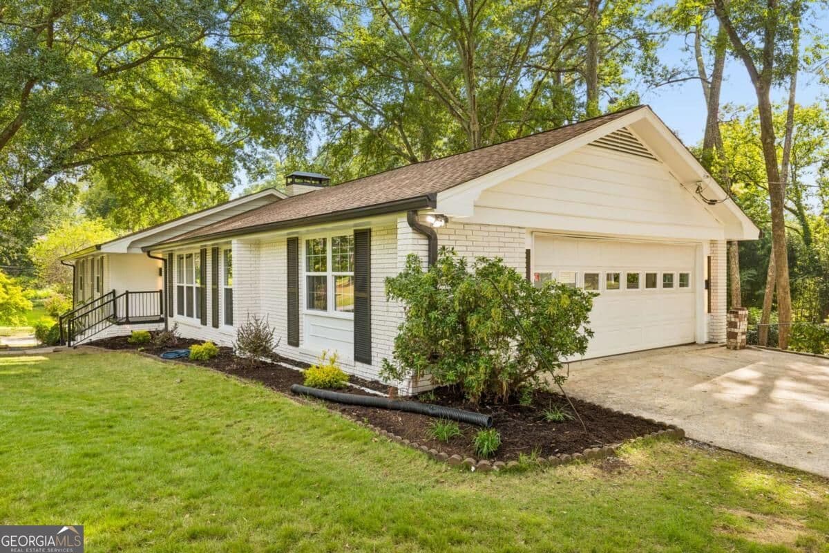5 bedroom, 4.5 bathroom, 3,542 sq ft single family residence for sale at 1896 Fisher Trail, Atlanta, GA 30345 — photo 2