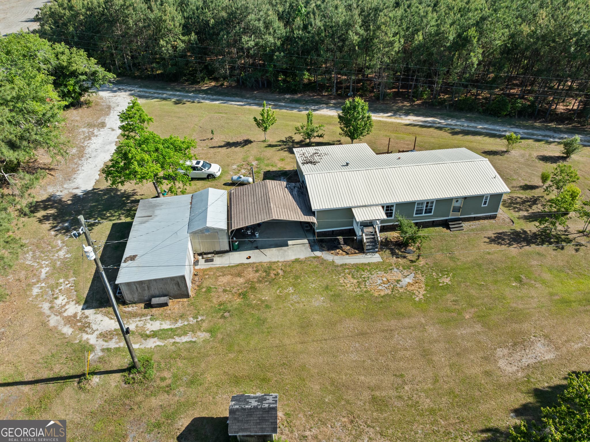 3 bedroom, 2 bathroom, 1,680 sq ft manufactured home,farm for sale at 40 Azalea Drive, Hazlehurst, GA 31539 — photo 2