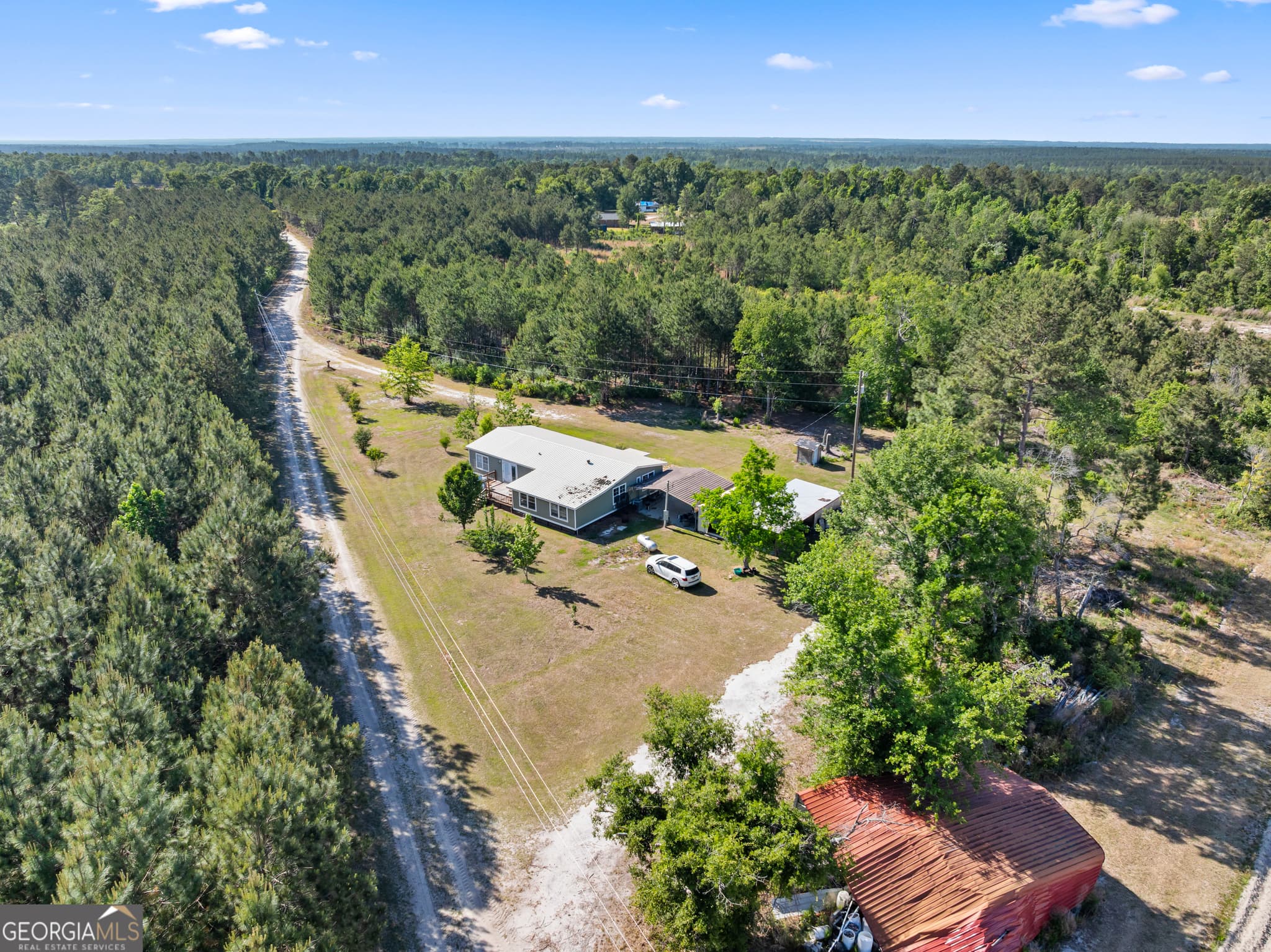 3 bedroom, 2 bathroom, 1,680 sq ft manufactured home,farm for sale at 40 Azalea Drive, Hazlehurst, GA 31539 — photo 6