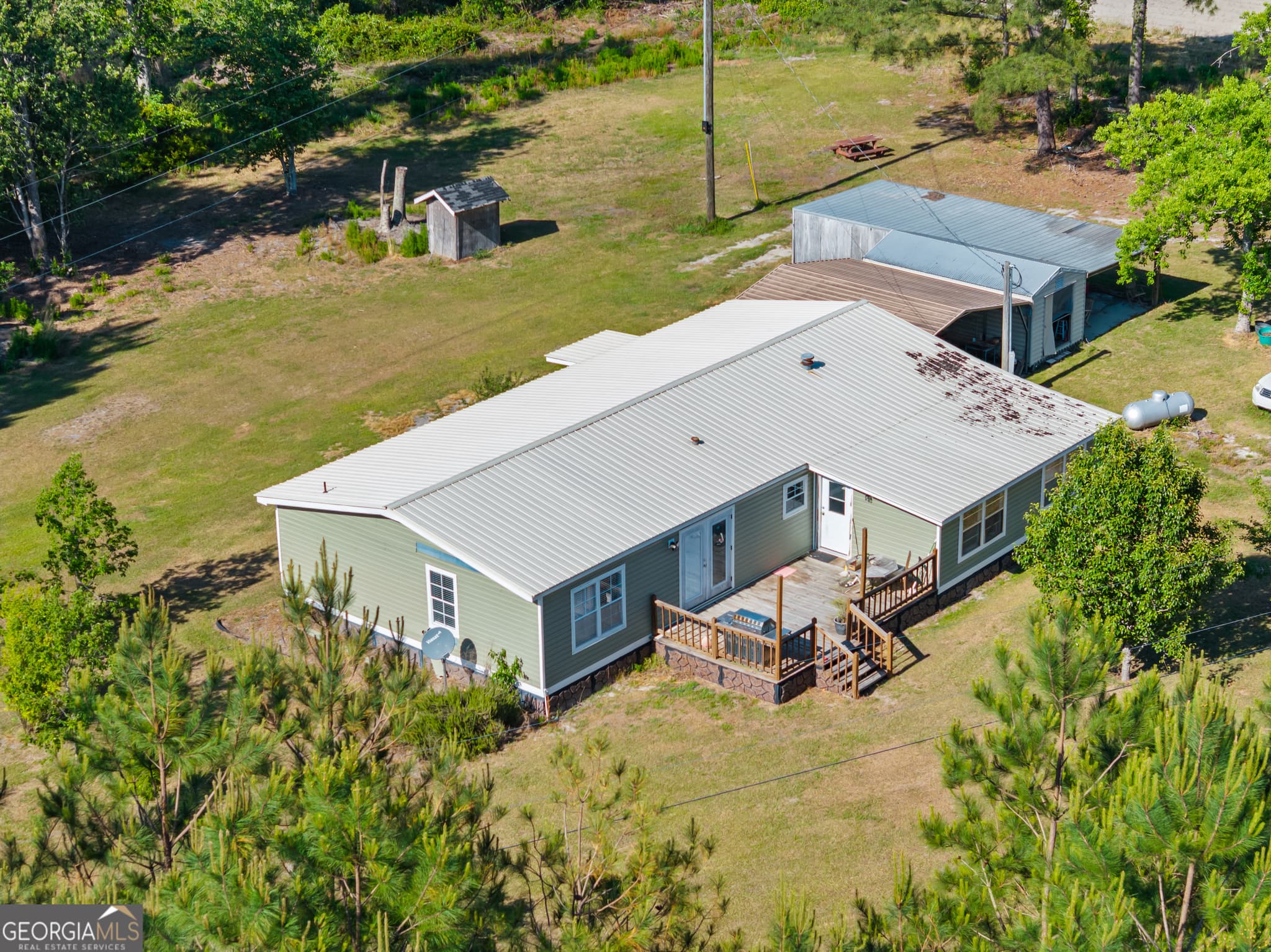 3 bedroom, 2 bathroom, 1,680 sq ft manufactured home,farm for sale at 40 Azalea Drive, Hazlehurst, GA 31539 — photo 7