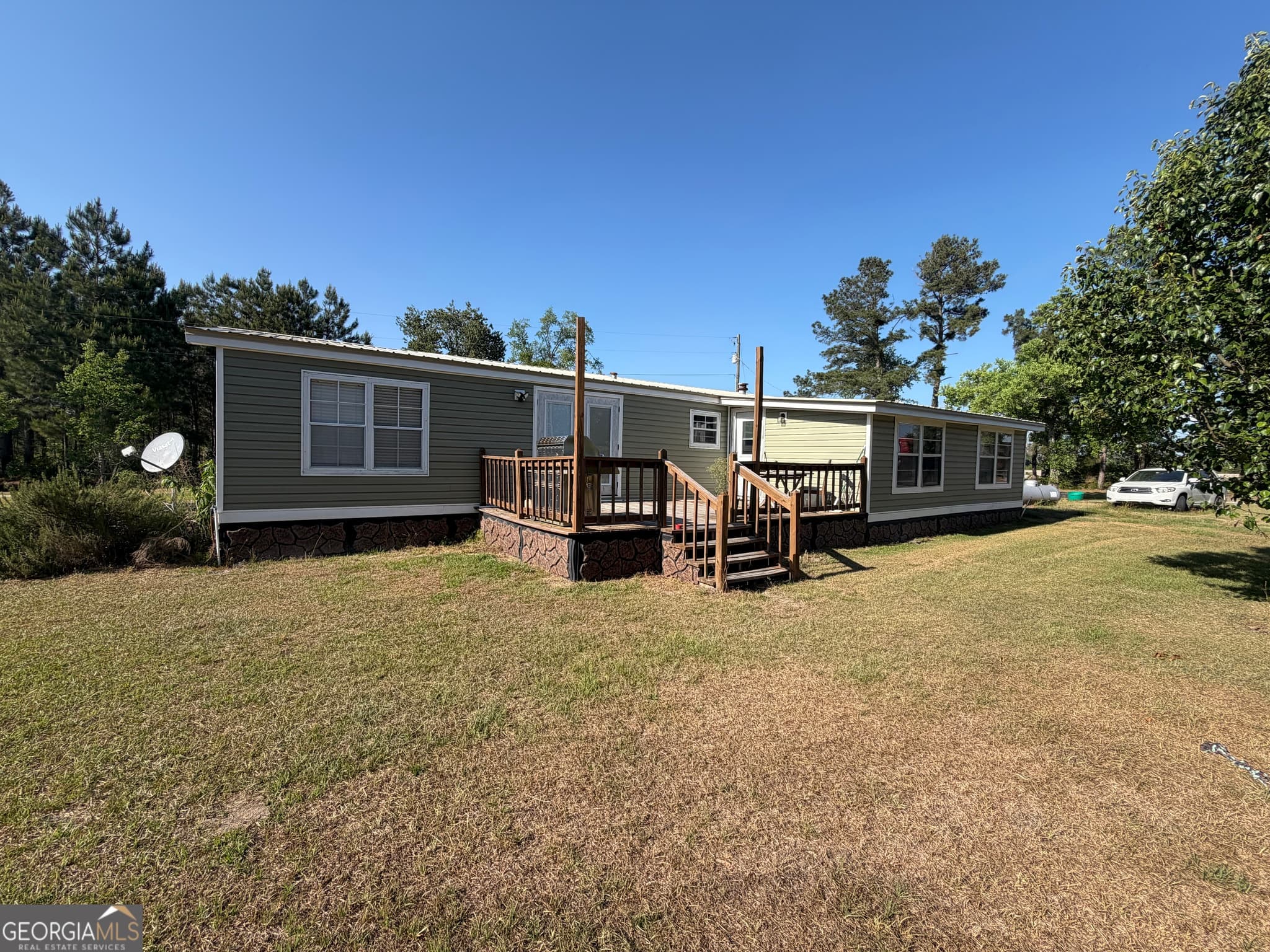3 bedroom, 2 bathroom, 1,680 sq ft manufactured home,farm for sale at 40 Azalea Drive, Hazlehurst, GA 31539 — photo 3