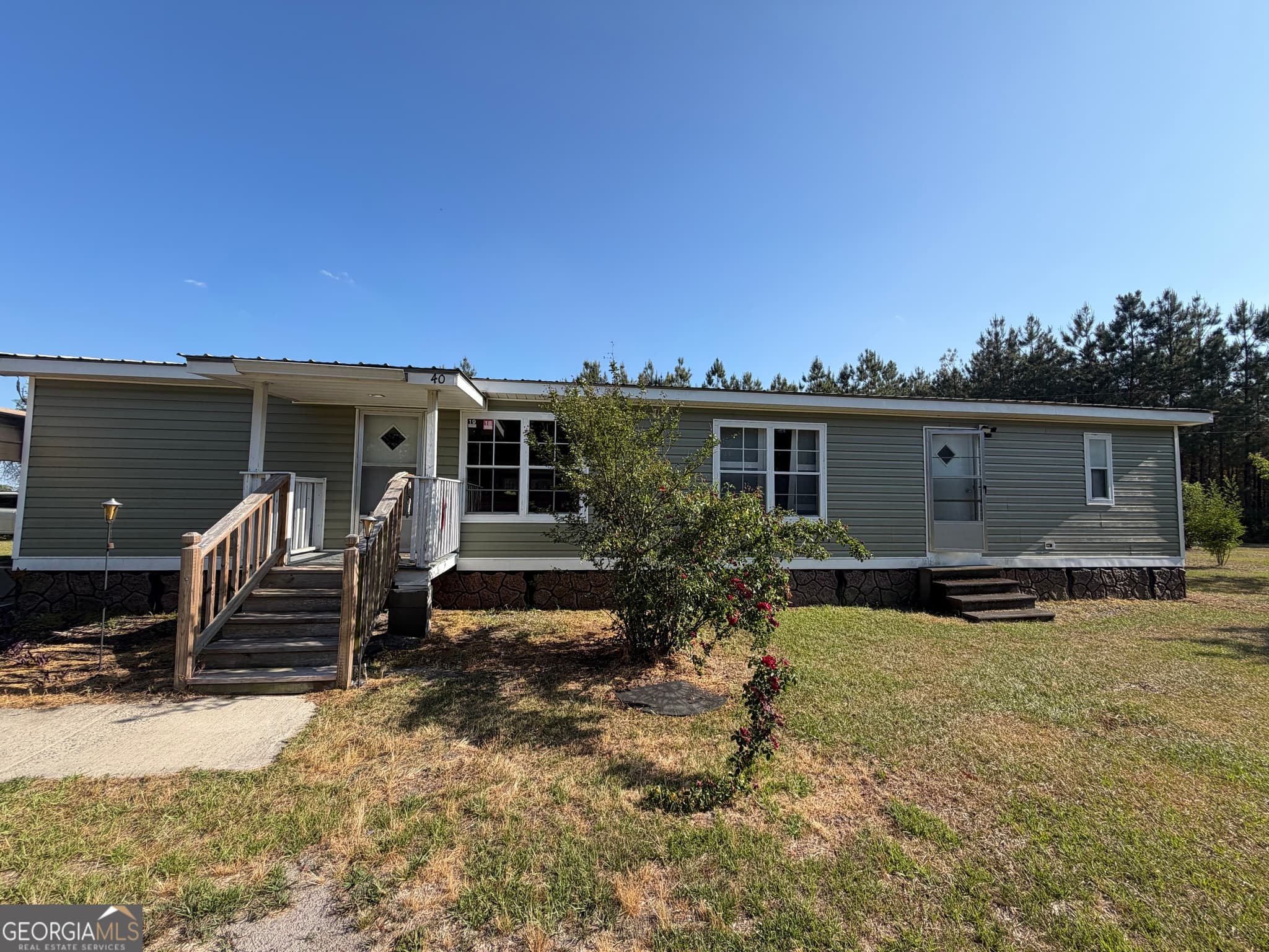 3 bedroom, 2 bathroom, 1,680 sq ft manufactured home,farm for sale at 40 Azalea Drive, Hazlehurst, GA 31539