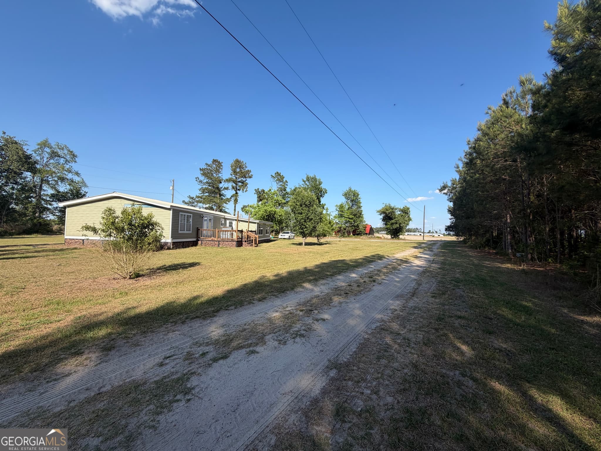 3 bedroom, 2 bathroom, 1,680 sq ft manufactured home,farm for sale at 40 Azalea Drive, Hazlehurst, GA 31539 — photo 5