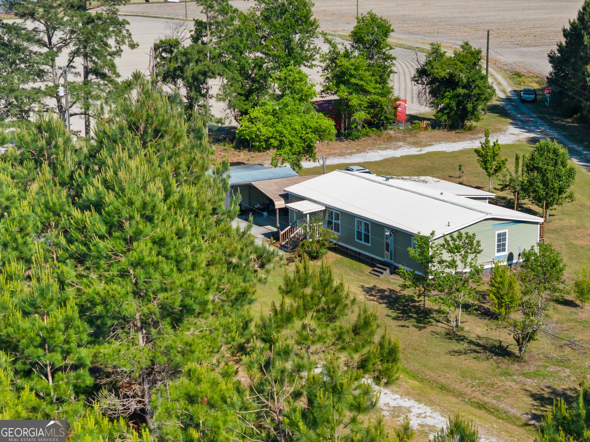 3 bedroom, 2 bathroom, 1,680 sq ft manufactured home,farm for sale at 40 Azalea Drive, Hazlehurst, GA 31539 — photo 9