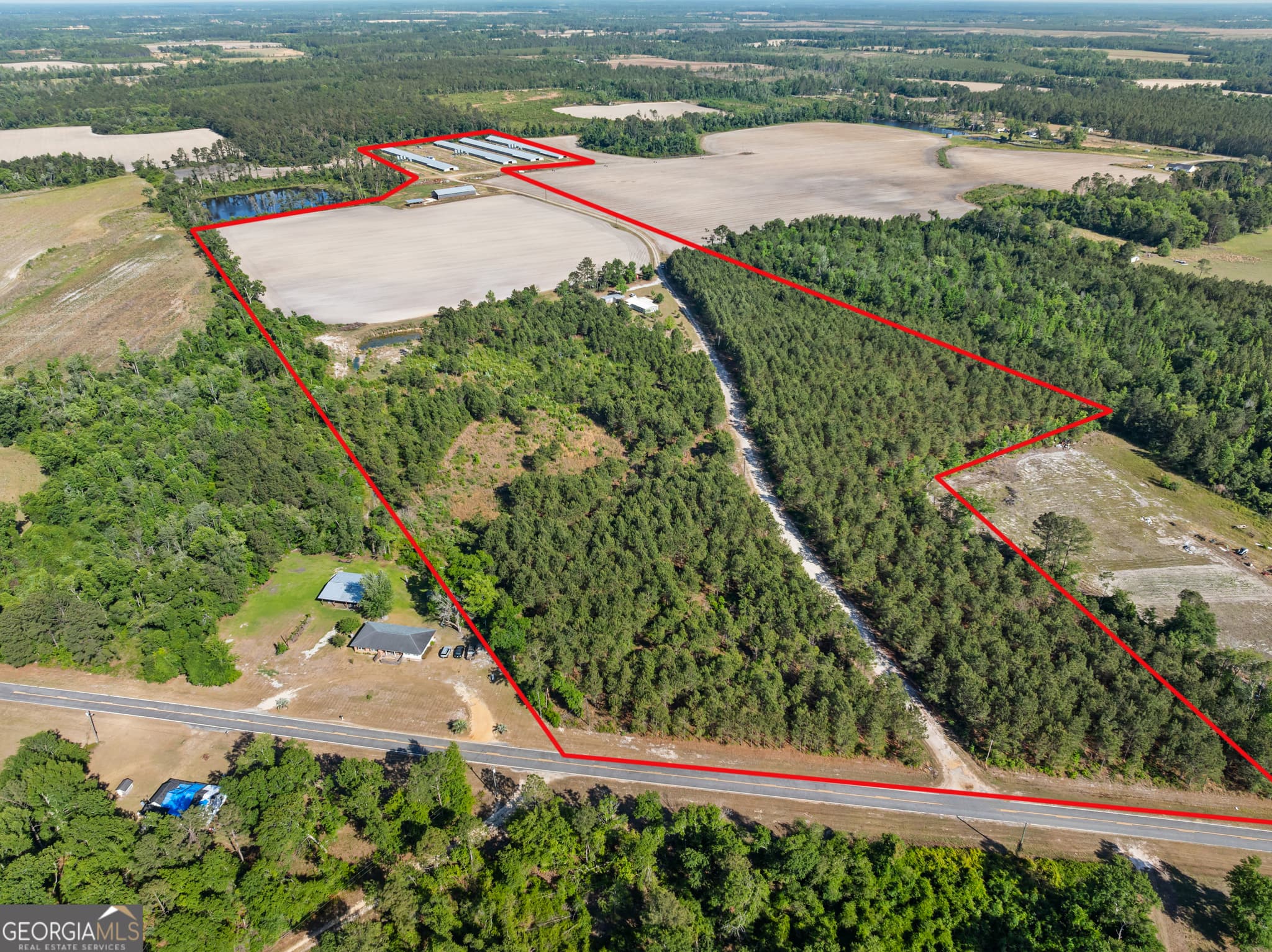 3 bedroom, 2 bathroom, 1,680 sq ft manufactured home,farm for sale at 40 Azalea Drive, Hazlehurst, GA 31539 — photo 4
