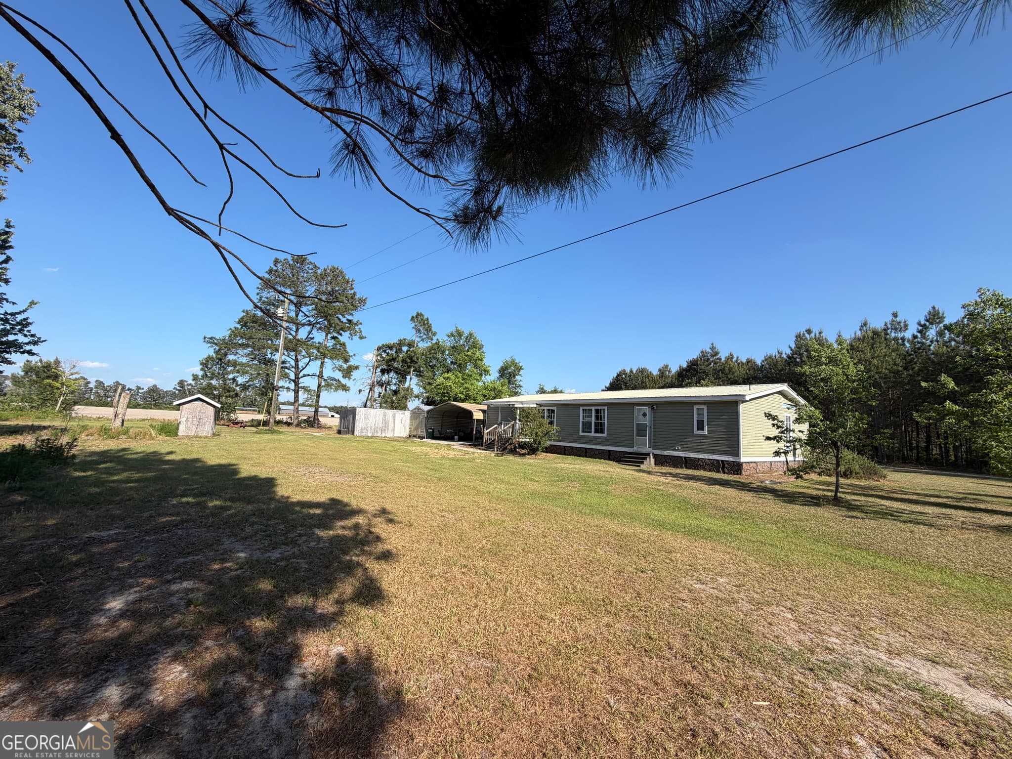 3 bedroom, 2 bathroom, 1,680 sq ft manufactured home,farm for sale at 40 Azalea Drive, Hazlehurst, GA 31539 — photo 8