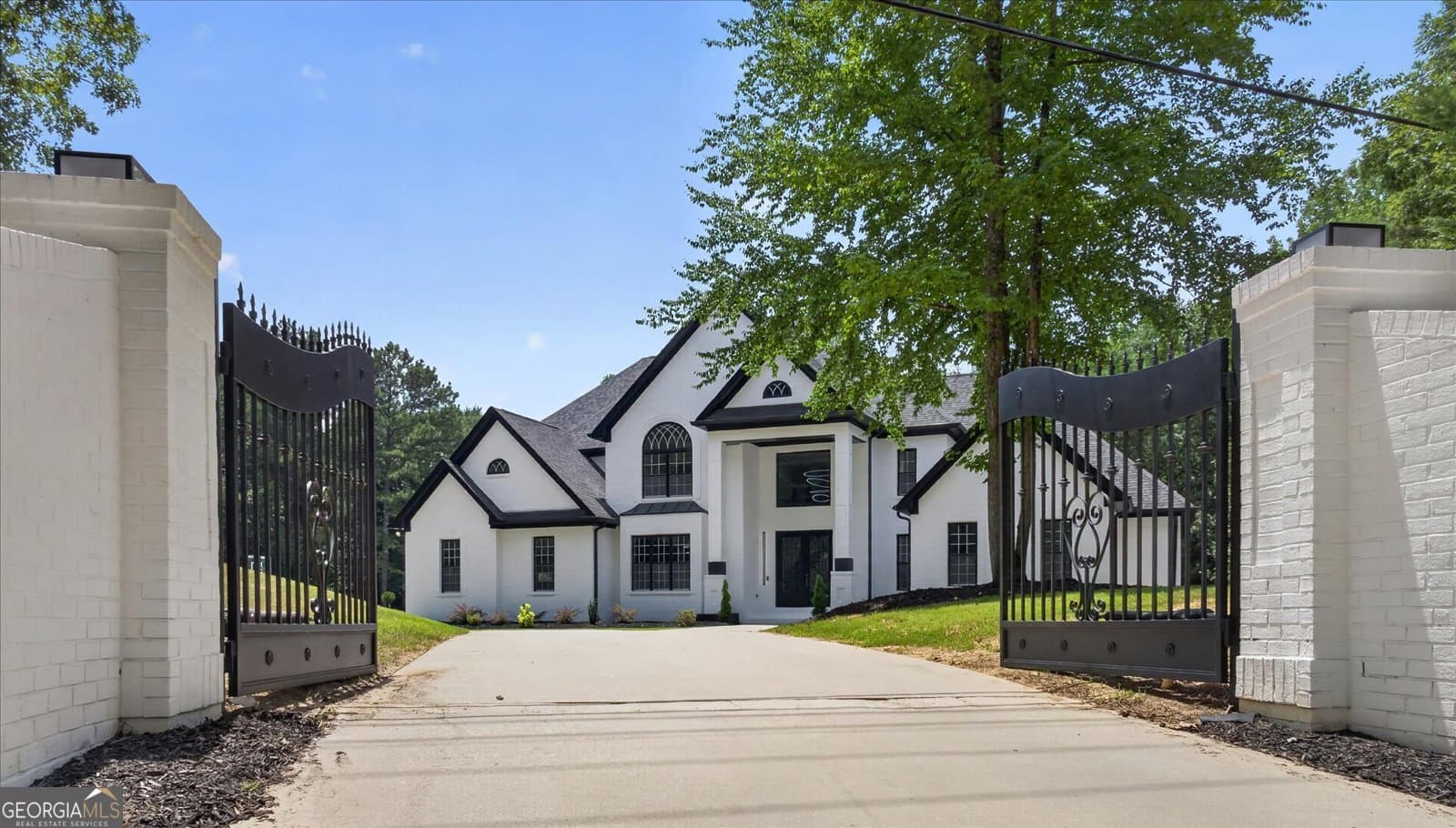 7 bedroom, 6.5 bathroom, 7,500 sq ft single family residence for sale at 3285 Stonewall Tell Road, South Fulton, GA 30349 — photo 2