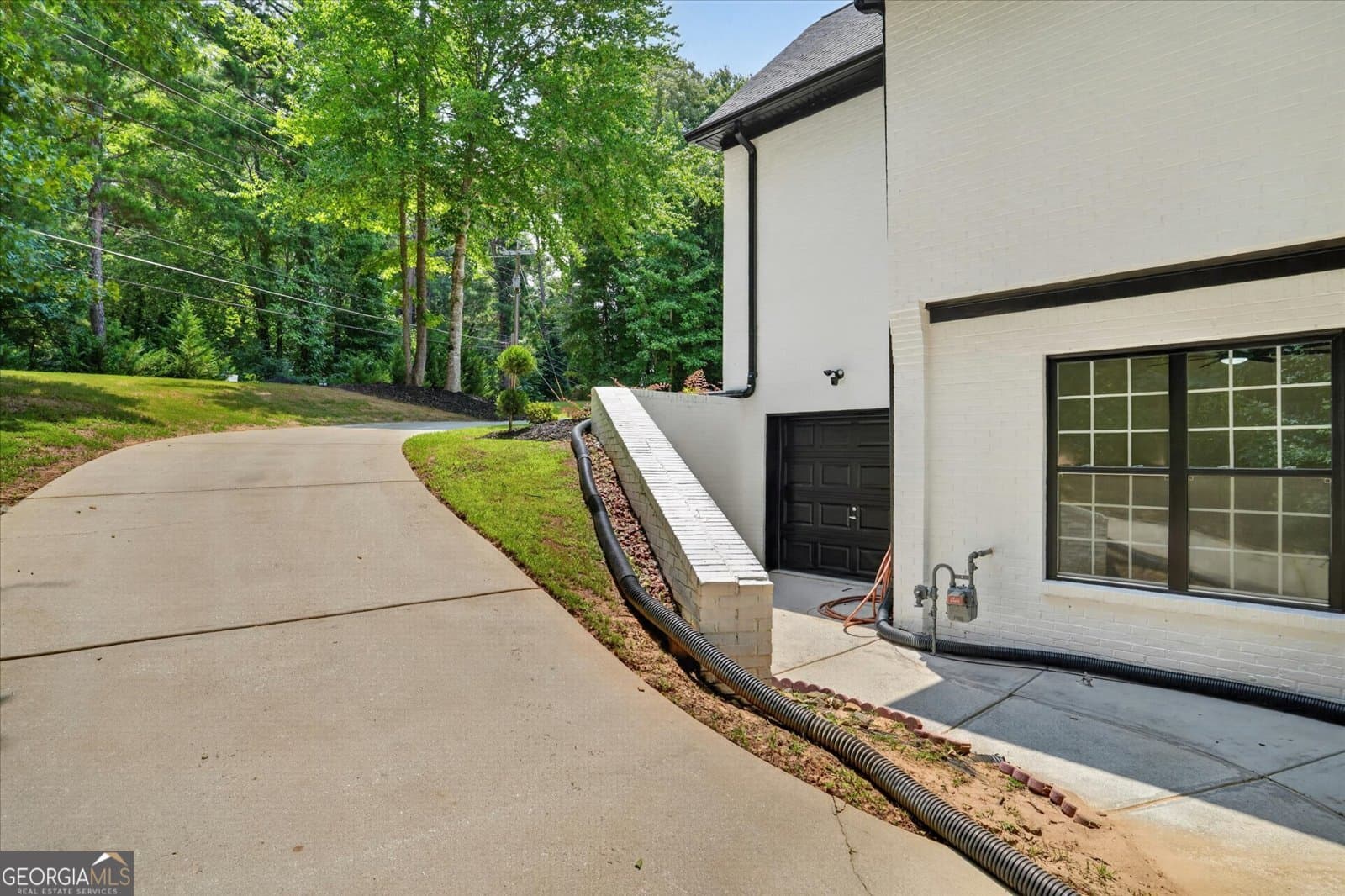 7 bedroom, 6.5 bathroom, 7,500 sq ft single family residence for sale at 3285 Stonewall Tell Road, South Fulton, GA 30349 — photo 6