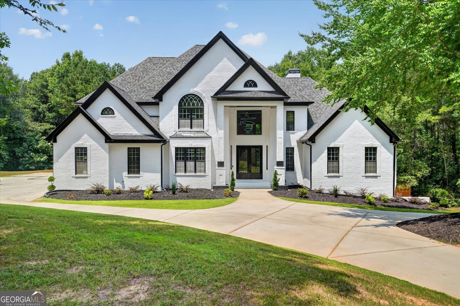 7 bedroom, 6.5 bathroom, 7,500 sq ft single family residence for sale at 3285 Stonewall Tell Road, South Fulton, GA 30349
