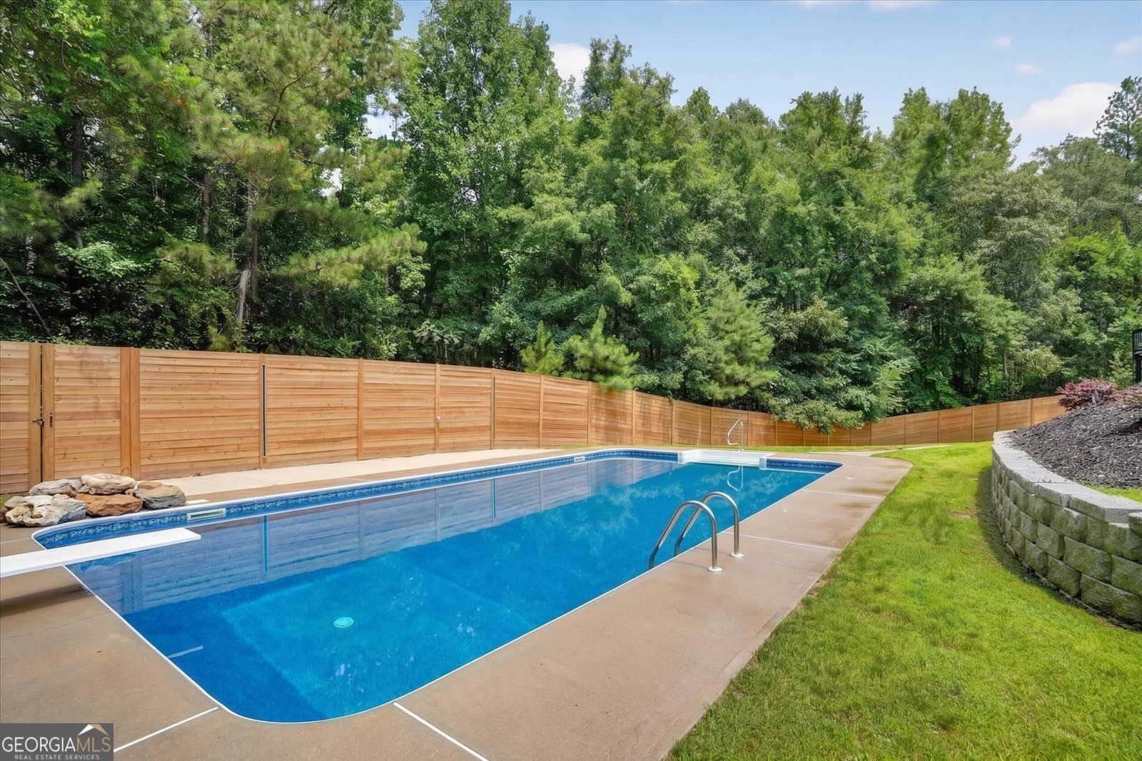 7 bedroom, 6.5 bathroom, 7,500 sq ft single family residence for sale at 3285 Stonewall Tell Road, South Fulton, GA 30349 — photo 5