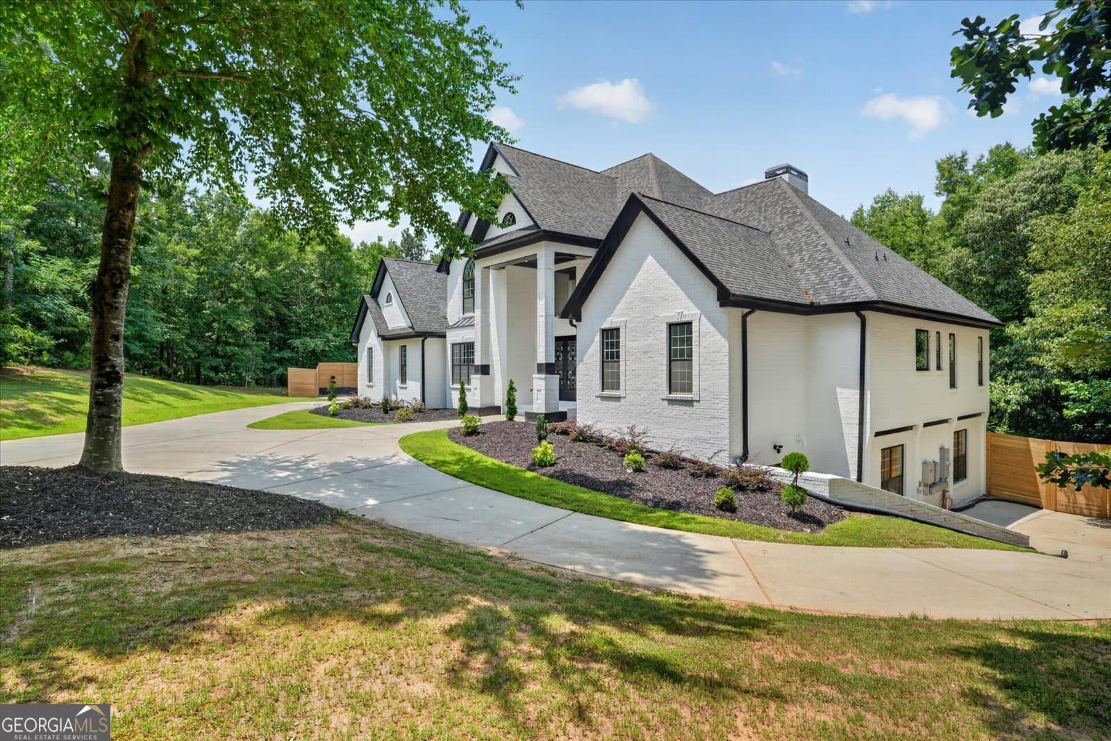 7 bedroom, 6.5 bathroom, 7,500 sq ft single family residence for sale at 3285 Stonewall Tell Road, South Fulton, GA 30349 — photo 9