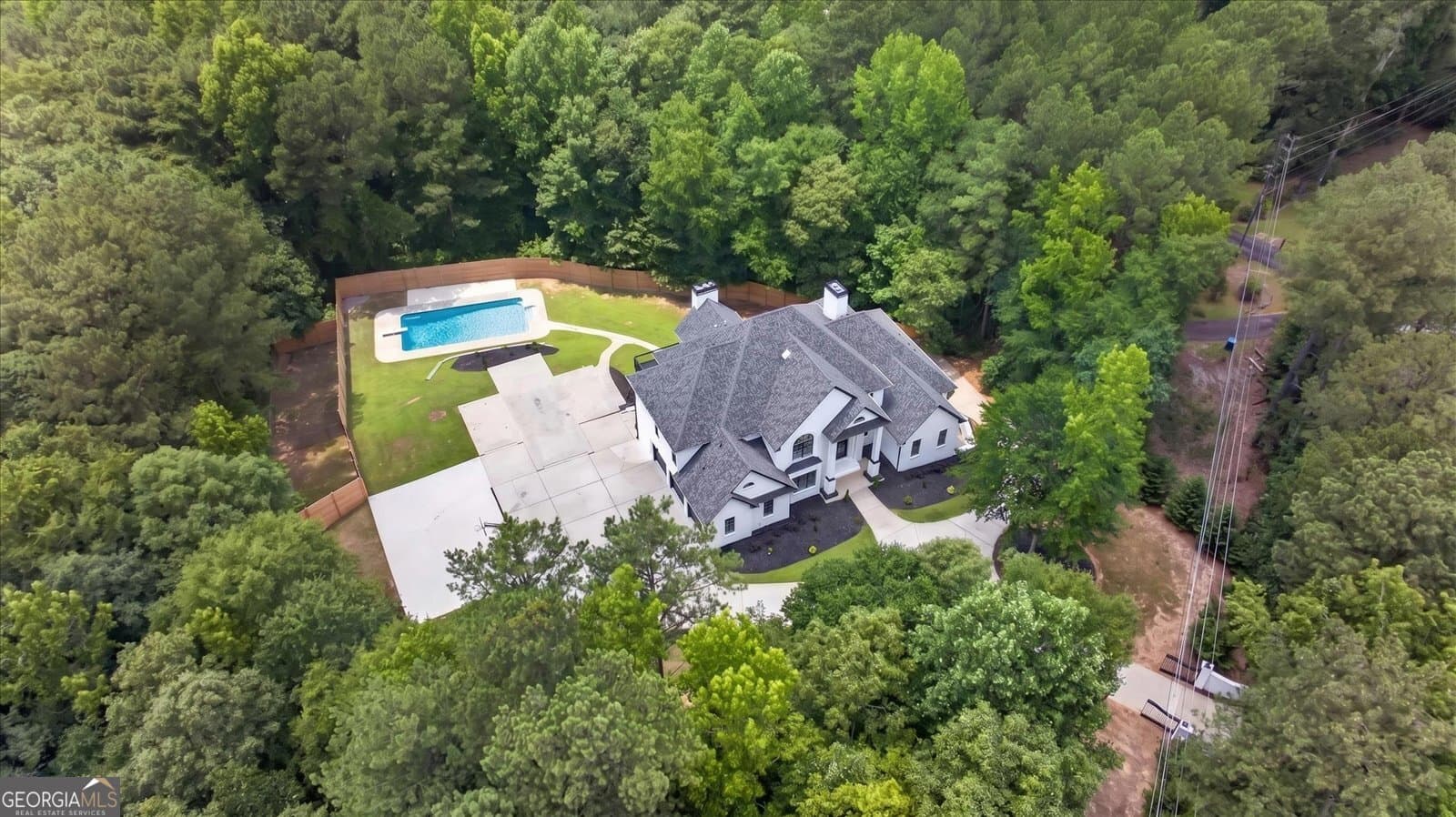 7 bedroom, 6.5 bathroom, 7,500 sq ft single family residence for sale at 3285 Stonewall Tell Road, South Fulton, GA 30349 — photo 4