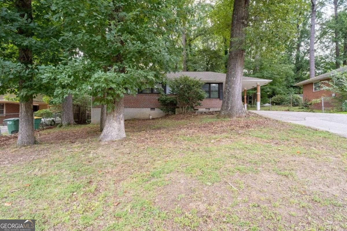 3 bedroom, 1.5 bathroom, 975 sq ft single family residence for sale at 4642 Bartlett Road, Forest Park, GA 30297 — photo 3