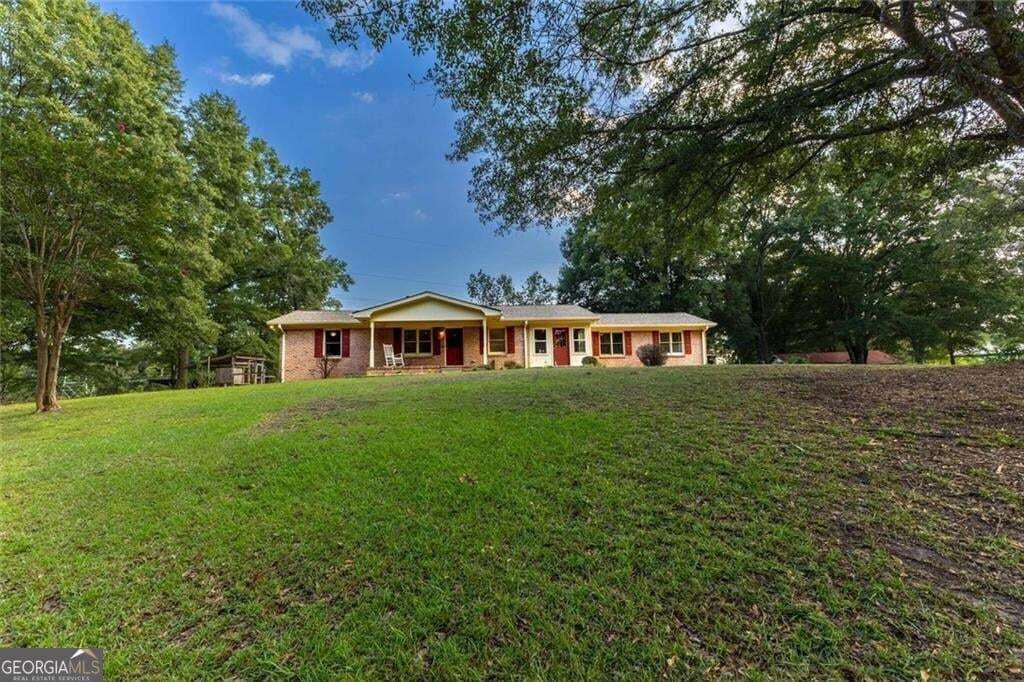 3 bedroom, 2 bathroom, 2,174 sq ft single family residence for sale at 8410 Cleckler Road, Palmetto, GA 30268 — photo 2