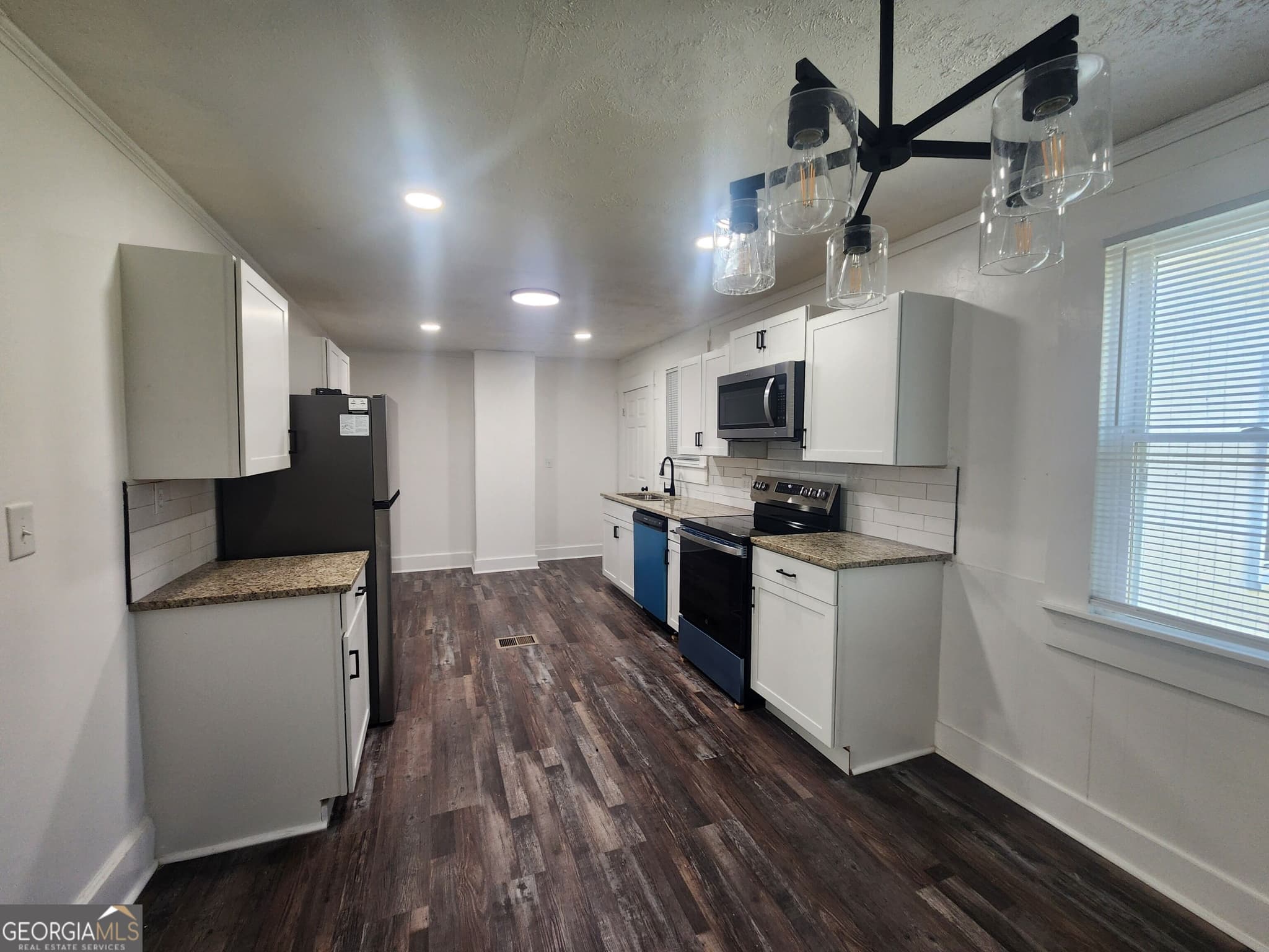 4 bedroom, 2 bathroom, 1,700 sq ft single family residence for rent at 5503 Buena Vista Road, Columbus, GA 31907 for $1,500 a month — photo 9