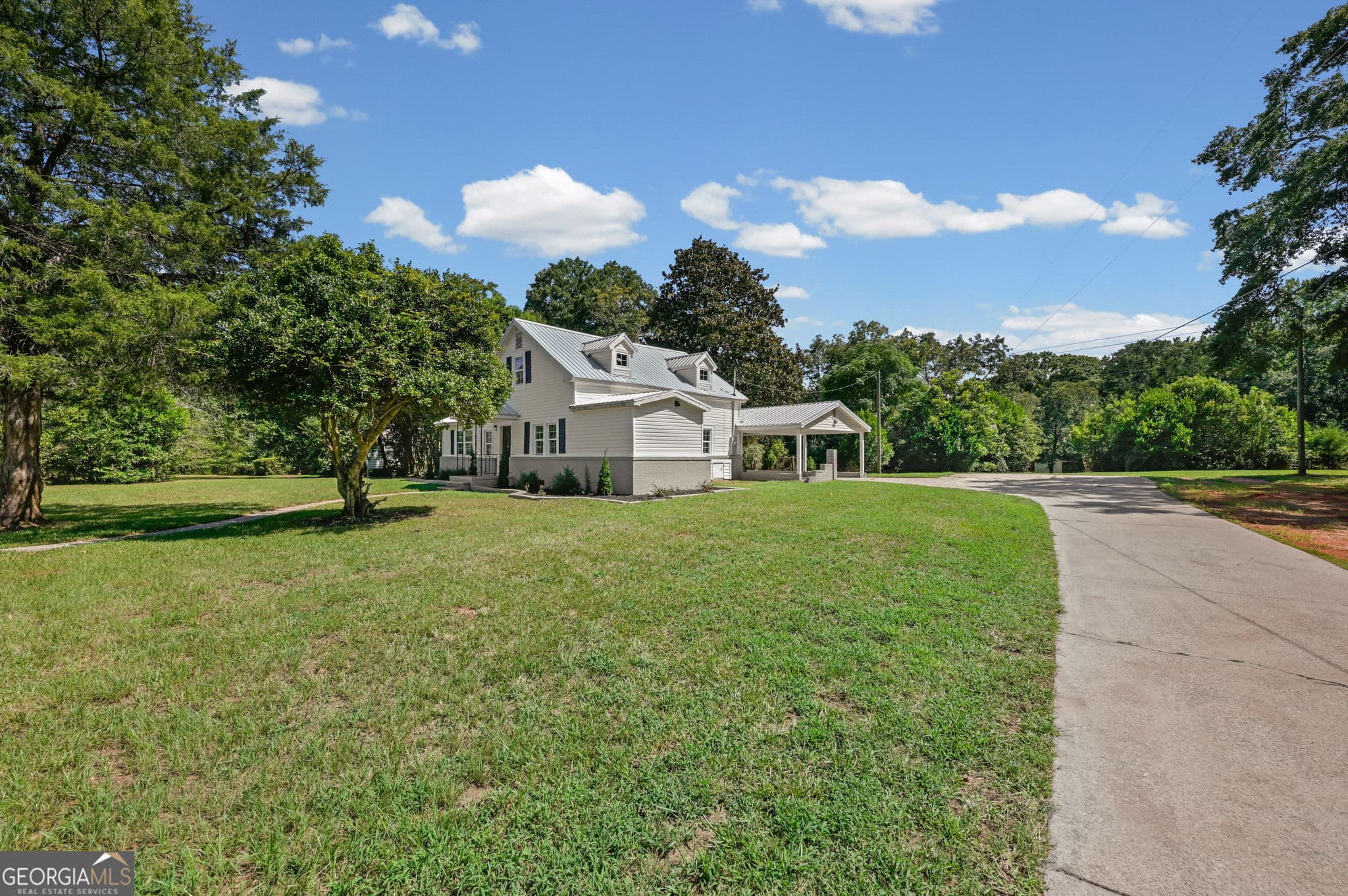 4 bedroom, 2.5 bathroom, 1,514 sq ft single family residence for sale at 1104 E McIntosh Road, Griffin, GA 30223 — photo 2