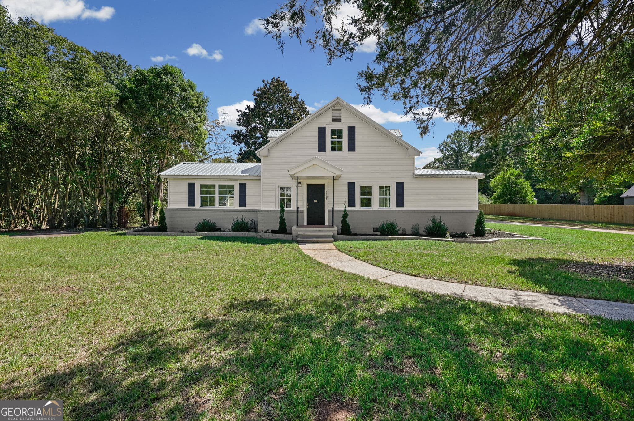 4 bedroom, 2.5 bathroom, 1,514 sq ft single family residence for sale at 1104 E McIntosh Road, Griffin, GA 30223 — photo 3