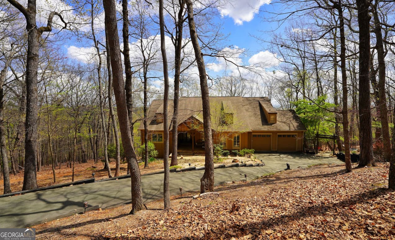 4 bedroom, 3.5 bathroom, 3,969 sq ft single family residence sold at 132 Ahaluna Place, Big Canoe, GA 30143