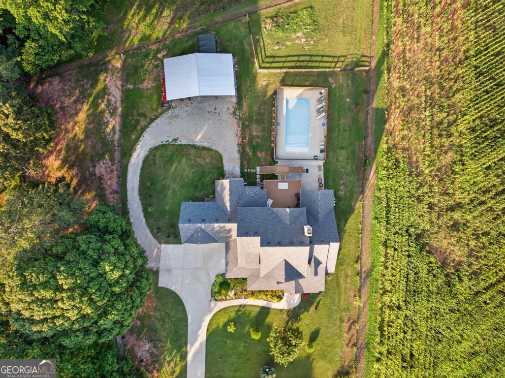 5 bedroom, 4.5 bathroom, 6,656 sq ft single family residence for sale at 1200 Woodlawn Road, Mansfield, GA 30055 — photo 7
