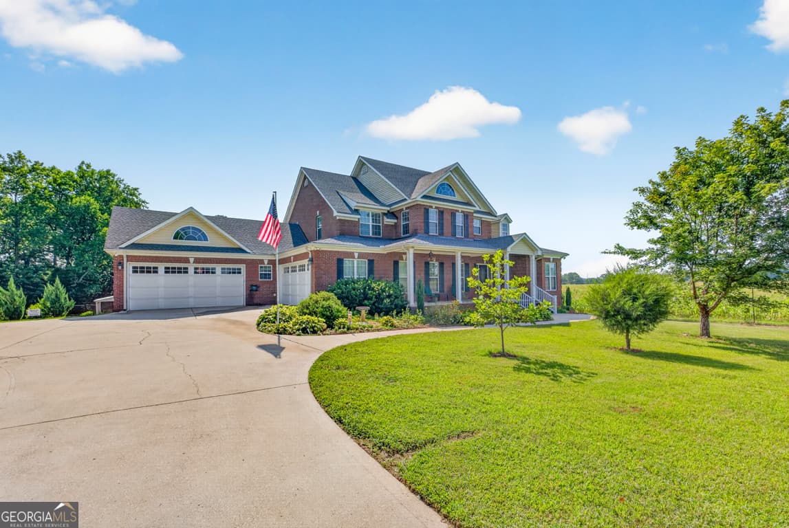 5 bedroom, 4.5 bathroom, 6,656 sq ft single family residence for sale at 1200 Woodlawn Road, Mansfield, GA 30055 — photo 3