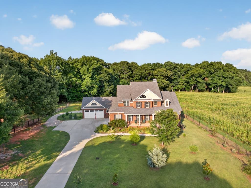 5 bedroom, 4.5 bathroom, 6,656 sq ft single family residence for sale at 1200 Woodlawn Road, Mansfield, GA 30055