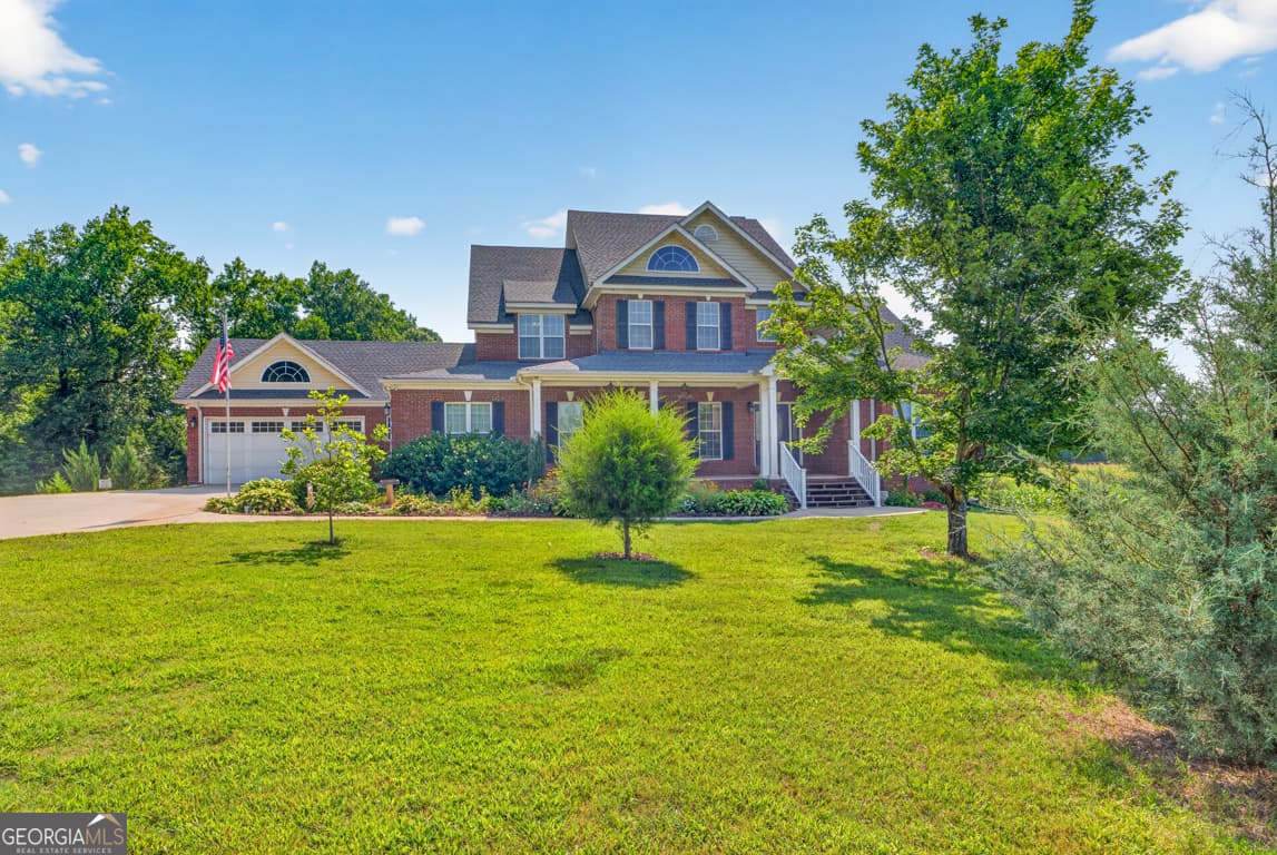 5 bedroom, 4.5 bathroom, 6,656 sq ft single family residence for sale at 1200 Woodlawn Road, Mansfield, GA 30055 — photo 4