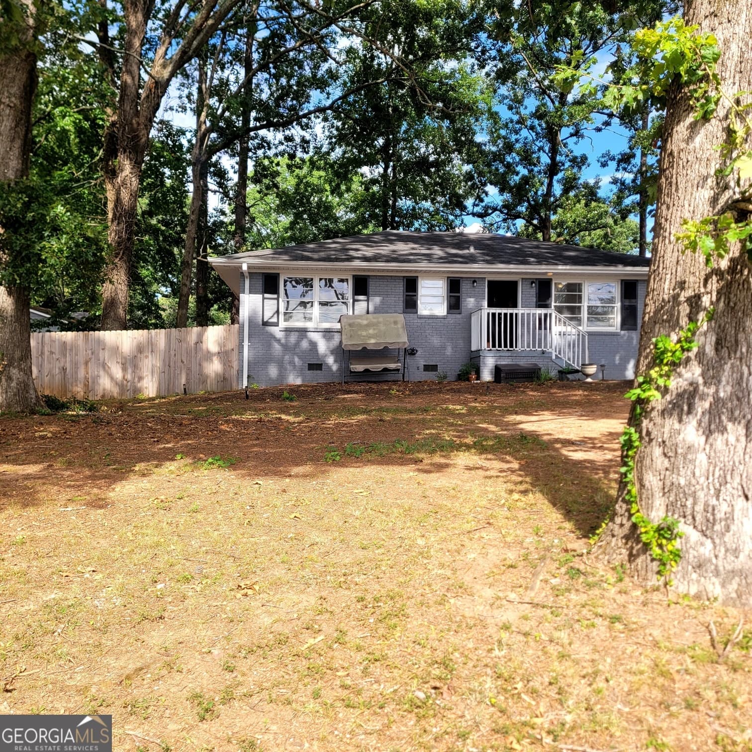 3 bedroom, 1 bathroom, 1,189 sq ft single family residence for sale at 7986 Scarlett Drive, Jonesboro, GA 30236 — photo 1 of 27