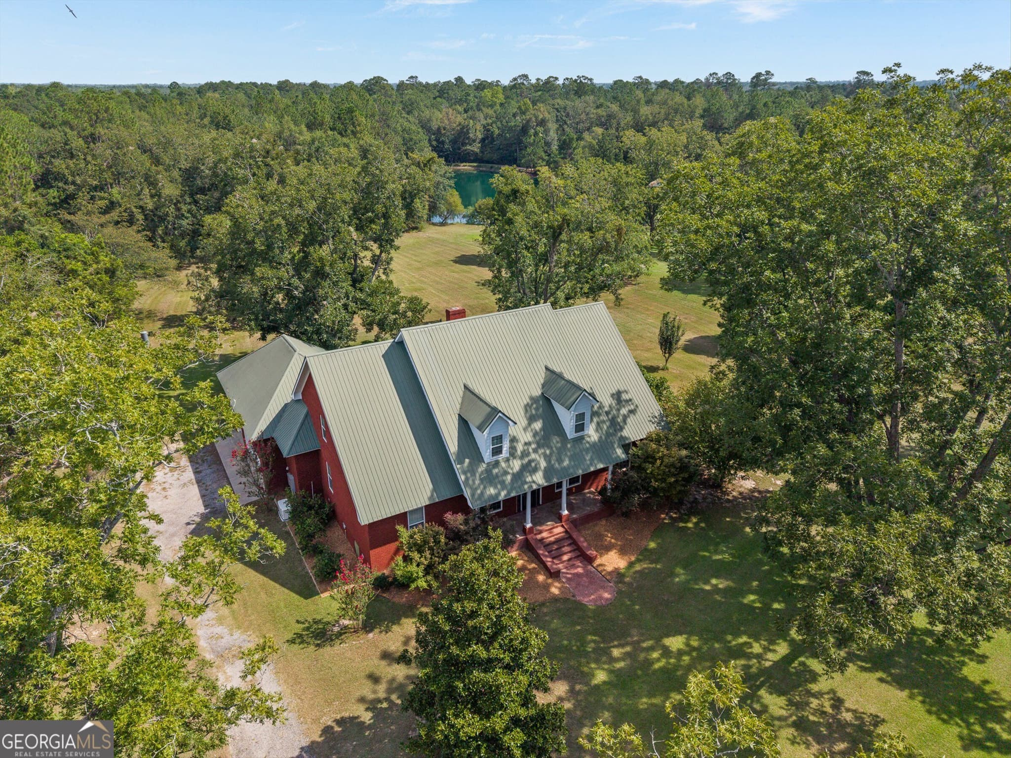 5 bedroom, 3.5 bathroom, 3,900 sq ft single family residence for sale at 321 Old Hardy Place Road, Statesboro, GA 30461 — photo 2